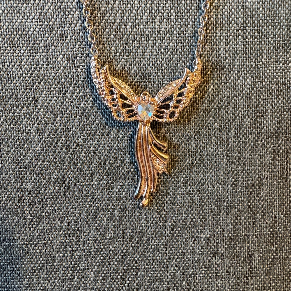 Elegant Gold and Silver Angel Pendant Necklace
